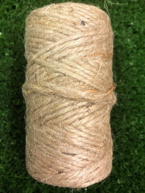 Premium Photo  Natural jute twine roll on white wooden